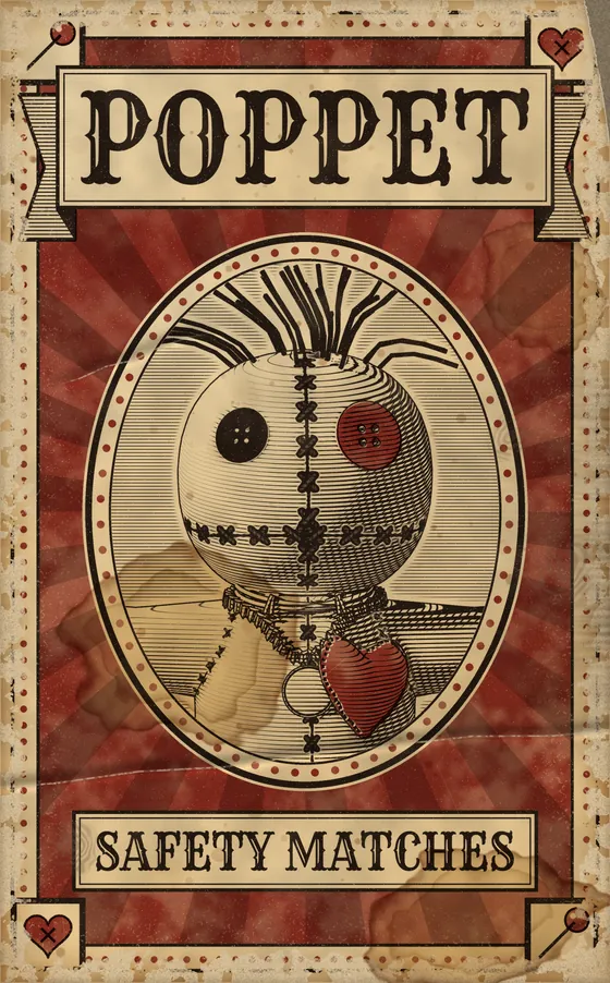 A vintage matchbox label reading Poppet, Safety Matches, with an engraved cloth doll with button eyes, cross-stitched seams and a red heart.